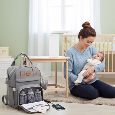 Sac a langer gris avec maman et bébé