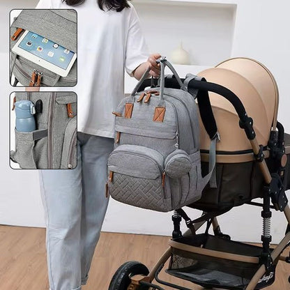 Sac a langer gris pâle avec maman et poussette
