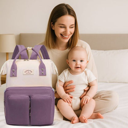 Sac a langer mauve et beige avec maman et bébé