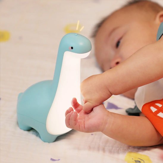 Veilleuse bébé dinosaure bleue avec bébé